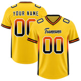 Custom Gold Orange and Black Sides Gradient Fashion Personalized Team Football Jersey