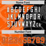 Custom Black Orange Split Personalized Lightning Pattern Football Jersey